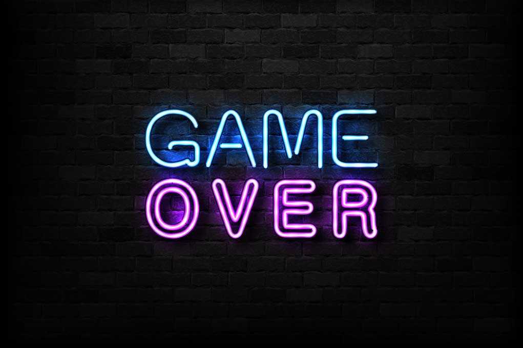 1197455563 featured image "Game Over" neon sign on brick wall.