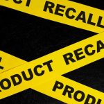 Urgent Recall: Allergen Lurks In Popular Supplement Yellow product recall tape on black background