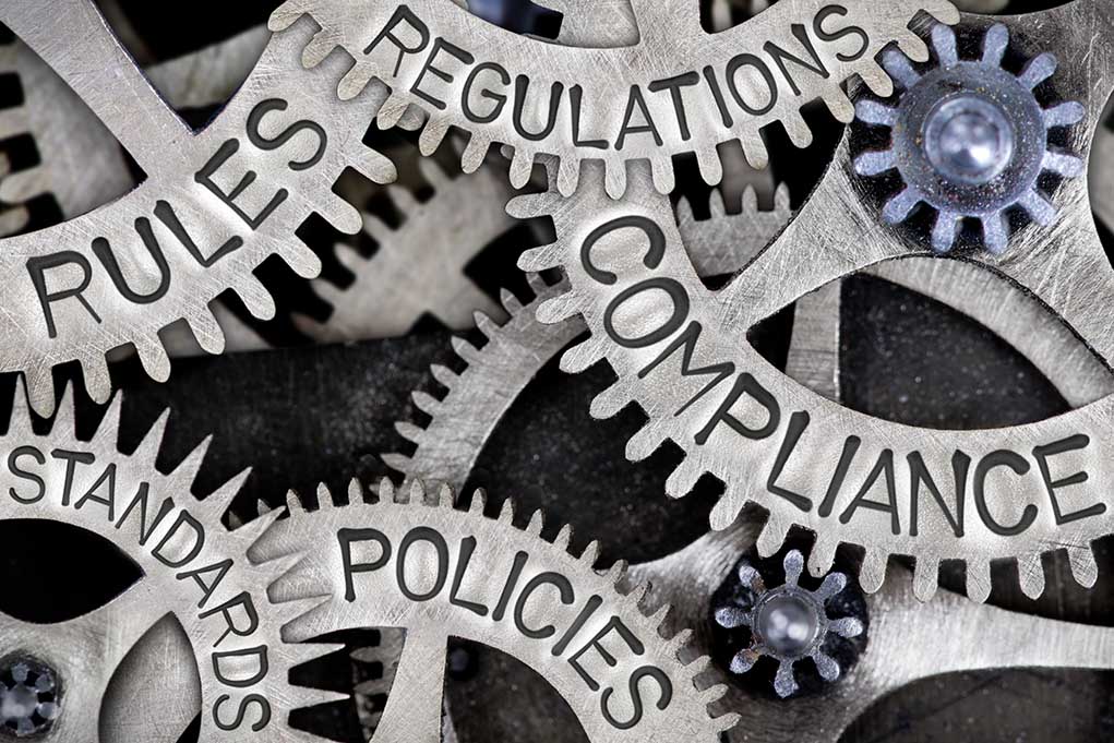 635952077 featured image Gears labeled rules standards regulations compliance policies