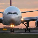 Delta’s Nerve-Wracking Close Call: 200 Feet From Disaster Airplane on runway during sunset