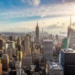 Mamdani’s “Privilege” Sparks Outrage in NYC Race New York City skyline with Empire State Building