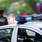 Naked Grammy Winner ARRESTED in Drug Meltdown Police car and officer on a city street.