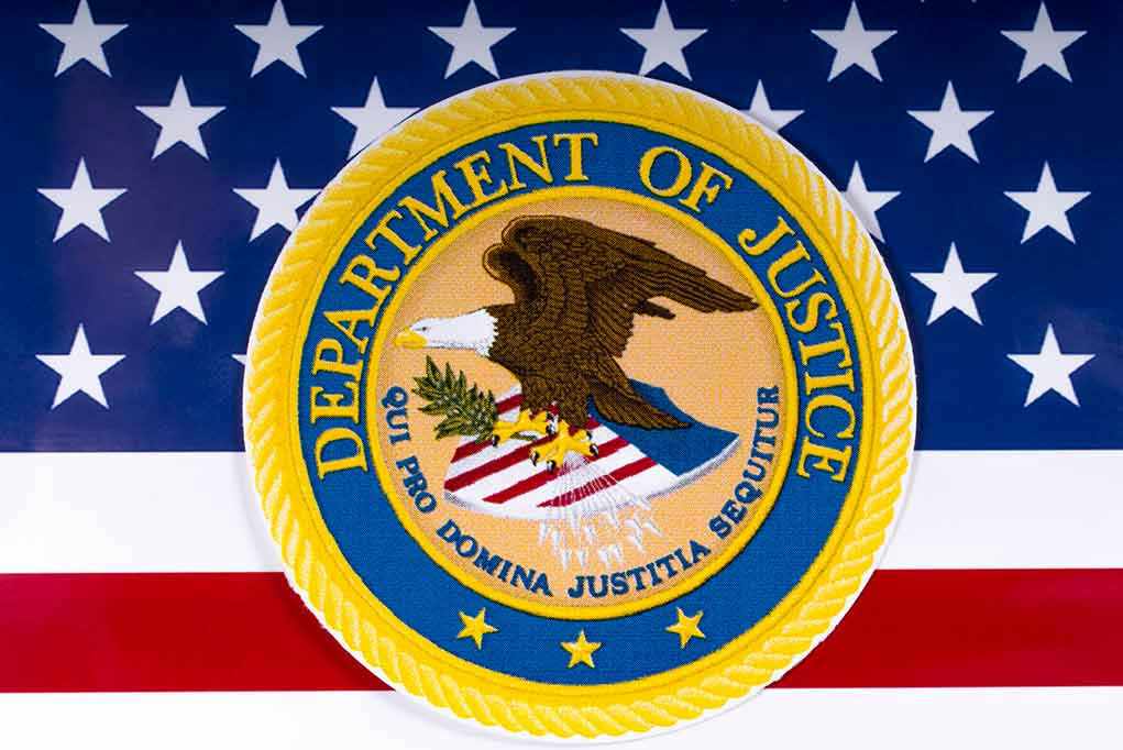 Trump Issues Bondi EXPLICIT ORDER – “Go After Opponents!” Department of Justice seal on American flag background.
