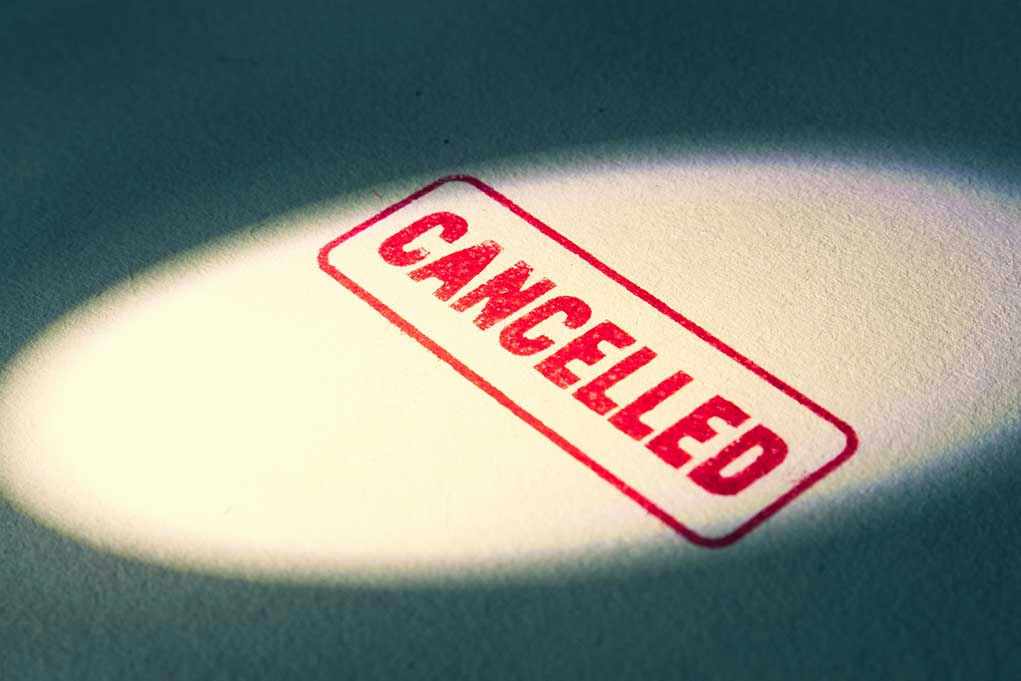 Conservatives Flip Cancel Culture Script – For Good Reason! Red Cancelled stamp under a spotlight.