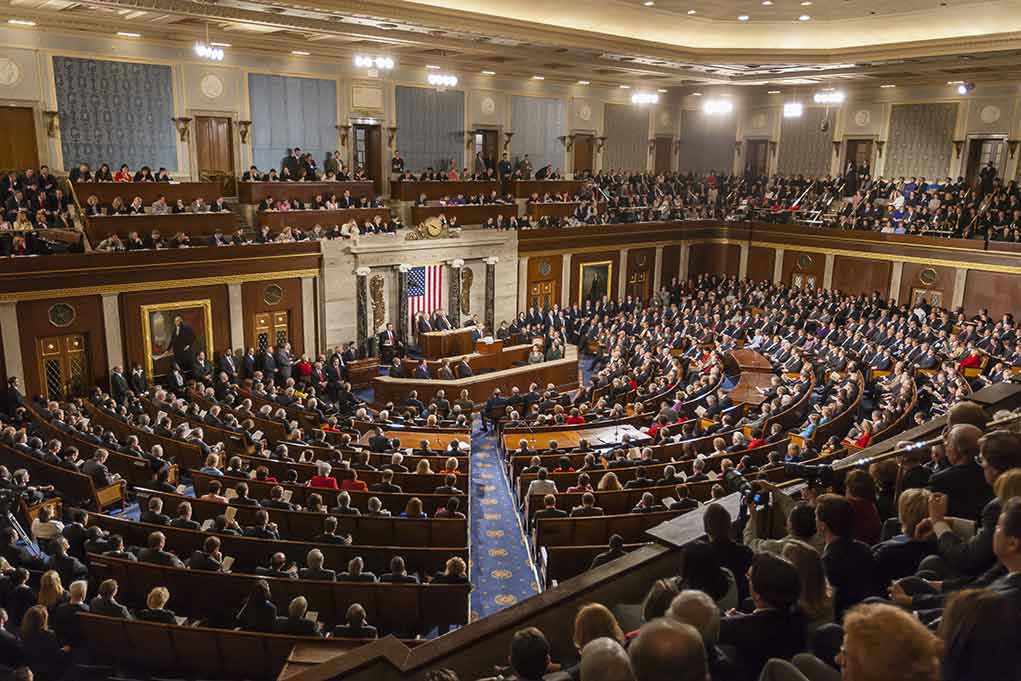 4 GOP TRAITORS NAMED – Betrayed Party! Large assembly in a government legislative chamber.