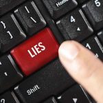 Crockett EXPLOITS Assassination — Spreads Dangerous LIES!! Finger pressing LIES key on keyboard.