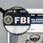 FBI RELEASE SUSPECT PIC – Manhunt Underway! FBI website shown through magnifying glass.