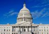 Congress AFFAIR Scandal: Aide Exposes DARK Rumors US Capitol Building against blue sky.