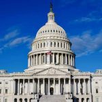 Congress AFFAIR Scandal: Aide Exposes DARK Rumors US Capitol Building against blue sky.