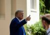 Trump Frees Felon—Congress ERUPTS Overnight Man in suit giving thumbs up.