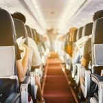 Airline CHAOS – Passengers Explode Midair! Passengers seated inside an airplane cabin.