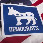 House Democrat BUSTED – Throws AWAY Police Funding Democrats logo on American flag background