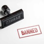 U.K’s SHOCK Move: Trump Style Visa Ban Drops! Banned stamp and rubber stamp on white background.