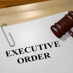 Dem Caught Red-Handed During CNN Panel A gavel resting on a document labeled 'EXECUTIVE ORDER'