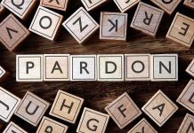 Trump PARDONS 77 Allies — But There’s a MASSIVE Problem Wooden letter blocks arranged to spell 'PARDON' on a wooden surface