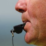 Referee’s SHOCKING Behavior Caught on Tape Close-up of a sports coach blowing a whistle