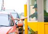 Government Decides How Citizens Should Eat Takeout Customer receiving a food order at a drive-thru window