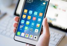 HORRIFYING Texts LEAK From Dead Staffer’s Phone A person holding a smartphone displaying various mobile applications