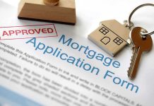 Mortgage Trap Looms for Millions Approved mortgage application form with a house key and keychain