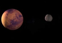 NASA Shocked By Possibility Of Martian Life A depiction of Mars and its moon in outer space