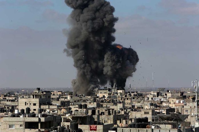 1973247644 Large explosion over a crowded urban area.