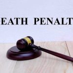 Gavel under Death Penalty text on white background.