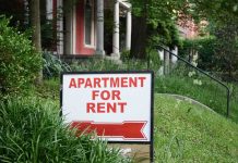 Sign indicating an apartment is available for rent
