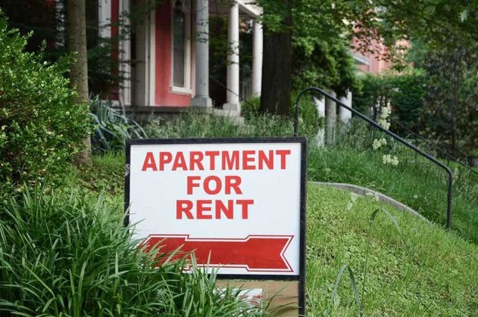 shutterstock_427488781.jpg Sign indicating an apartment is available for rent