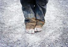 11-Year-Old VANISHES From Backyard A child standing barefoot on a gravel surface with dirty pants