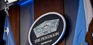 Iran’s Military DESTROYED—Pentagon’s Terrifying Mistake The Pentagon emblem between two flags.