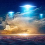 Admiral Makes SHOCK UFO Claims Glowing lights above dramatic sunset clouds.
