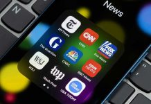 WaPo Editor EMBARRASSINGLY Erases Her Defense News app icons on a smartphone screen.