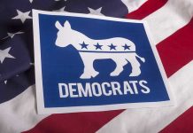 Dem Staffer Gets Into HEATED Altercation With GOP Constituent Democrats logo on American flag background