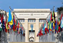 Taiwan Arms Deal Standoff—Beijing’s Pressure Tactics United Nations building with numerous national flags outside.