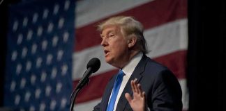 Trump’s Pastor Bro WITHDRAWS From Race! man in suit speaking at a podium with a US flag backdrop