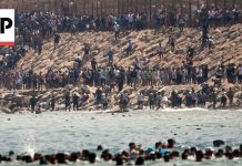 Border Shock: Italy Slams Door on Neighbors Thousands of migrants swim around the border from Morocco into Ceuta, Spain