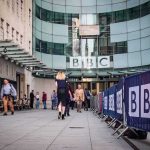 Migrant Knife Chaos Ignites Citywide MAYHEM People walking outside the BBC building entrance