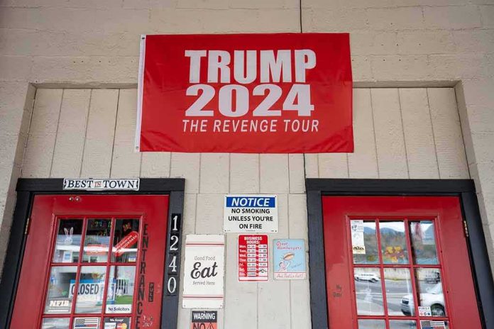 red political banner above two red doors on a storefront