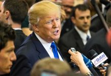 Trump Torches Fox News — Shots Fired at Bream man in suit speaking to reporters with microphones