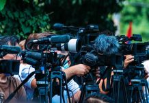 Heartfelt 9/11 Tribute Stuns New York TV news cameras crowding together at an outdoor event
