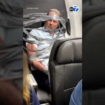 Out-of-Control Passenger Duct Taped Midflight Unruly passenger arrested after being restrained with duct tape during flight