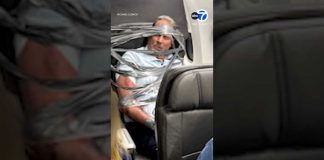 Out-of-Control Passenger Duct Taped Midflight Unruly passenger arrested after being restrained with duct tape during flight