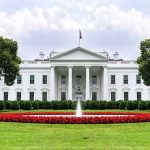 Trump, Musk Launch Controversial Gov Website: America.gov The White House with fountain and red flower bed