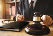 Migrant Assisting Judge Gets Off SCOT-FREE Judge with gavel striking sound block