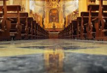 Dem Rep Slams Churches ‘Too Many Republicans There’ Church interior with wooden pews facing ornate altar
