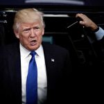 Trump Picks Singer’s Wife For TOP Ambassador Job man in suit stepping out of a vehicle