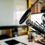 Radio’s Blacklist Singer Amid Gaza Controversy Podcast microphone with pop filter on desk