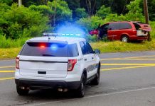 Dem Mayor’s Wife Injured After Fleeing Illegal Alien Police SUV with flashing lights at roadside crash scene