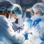 AI Robot Surgeon Completes FIRST Operation surgeons performing an operation
