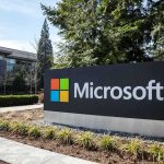 Microsoft FIRES Americans in Favor For Foreigners Microsoft sign outside a modern office campus